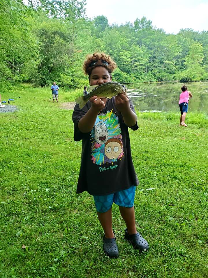 Girl holding fish
