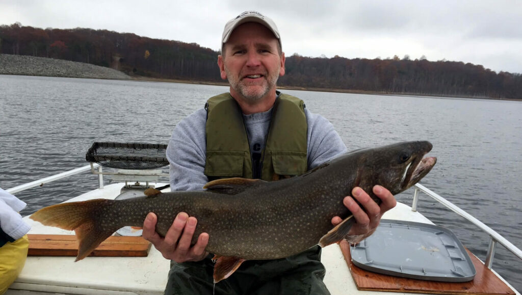 Angler with lake trout
