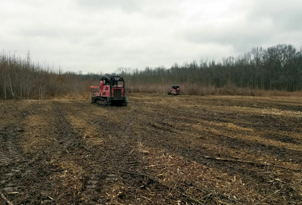 Hydro-ax machines creating open strips for woodcock habitat