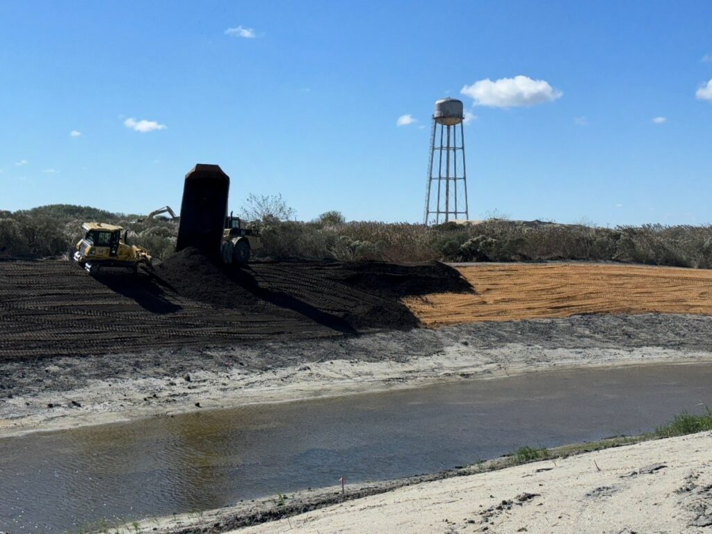 Picture16-oct2024 Placement of topsoil on the left bank of Pond Creek in preparation of seeding – October 2024