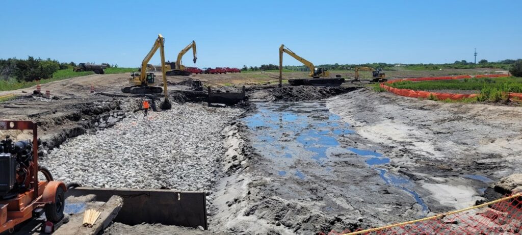 Picture25-june Excavation and placement of stone near the mouth of Pond Creek – June 2024