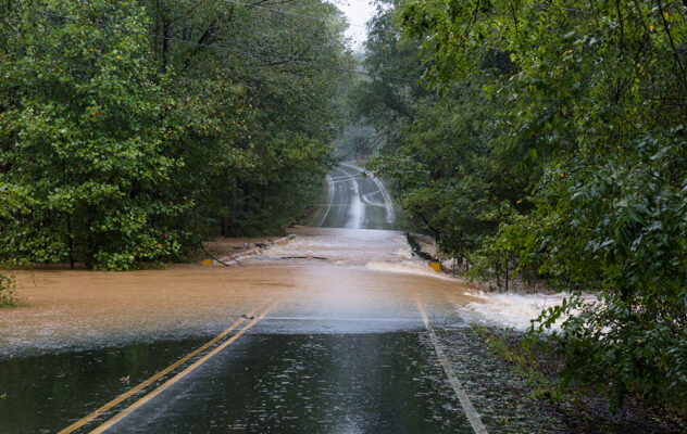 Torrential rain floods a road