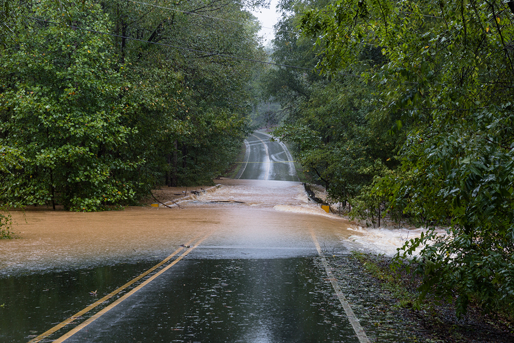 Torrential rain floods a road